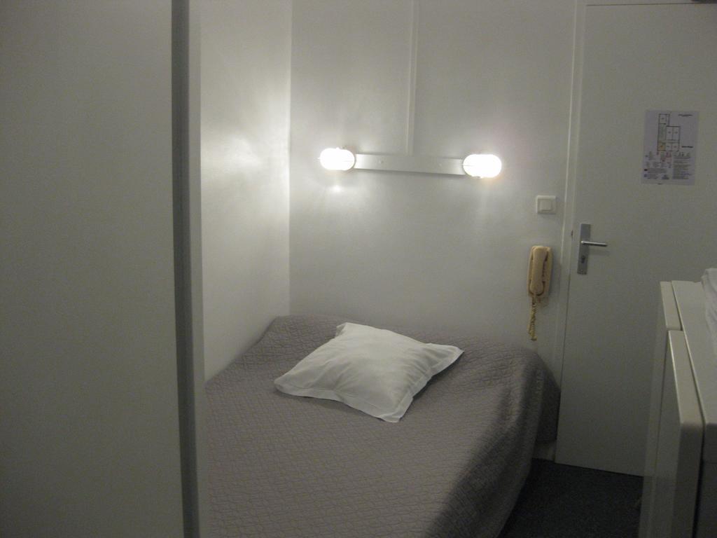 Le Monopole Hotel Reims Værelse billede